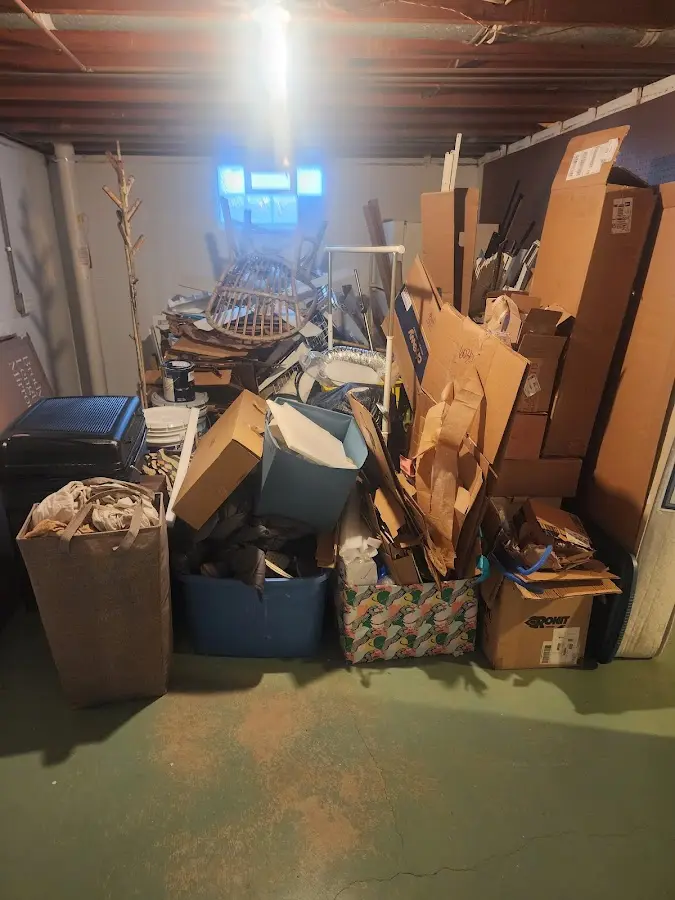 Roll-off dumpster container at job site for 4 Yard Dumpster Rental in Williamston